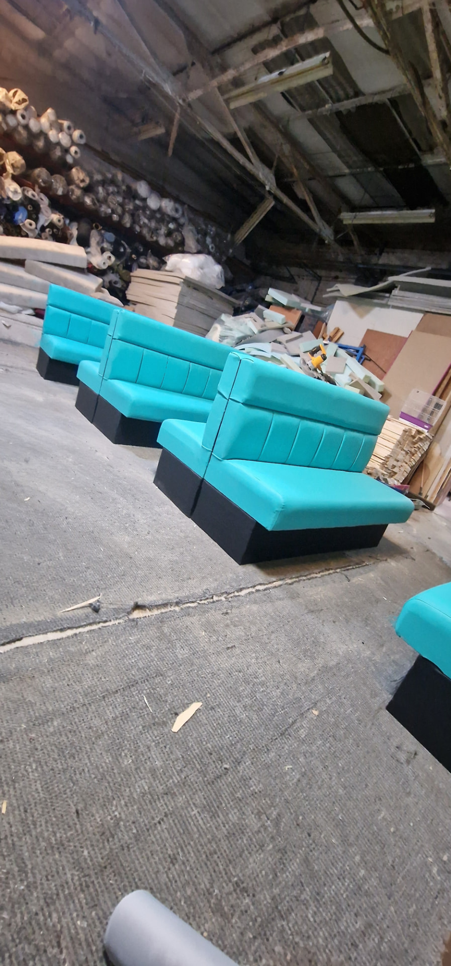 Booth seating reupholstered in turquoise vinyl by HSE Bespoke Upholstery Birmingham